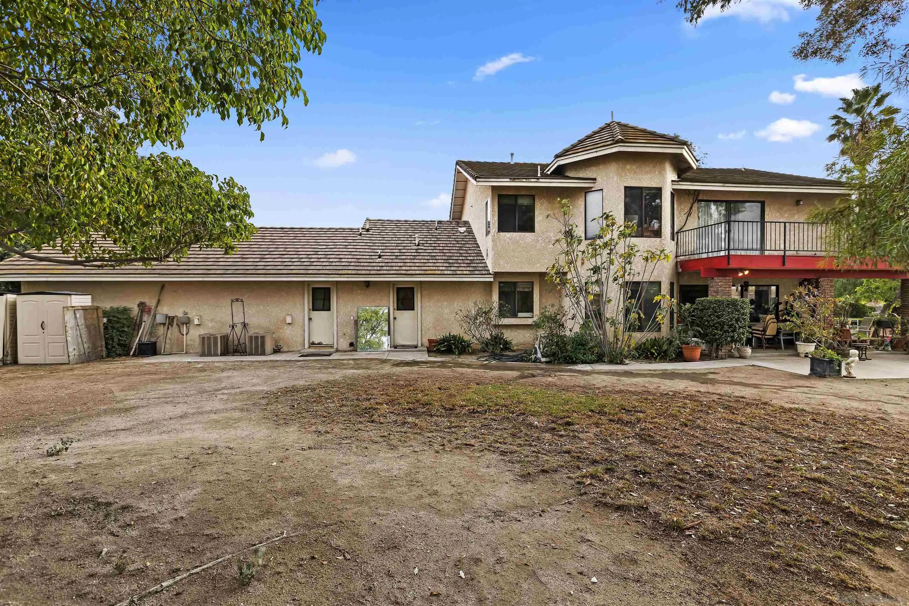 2109 Old Bridge Road Riverside, CA 92506 - Photo 50 of 57 a front view of a house with a yard