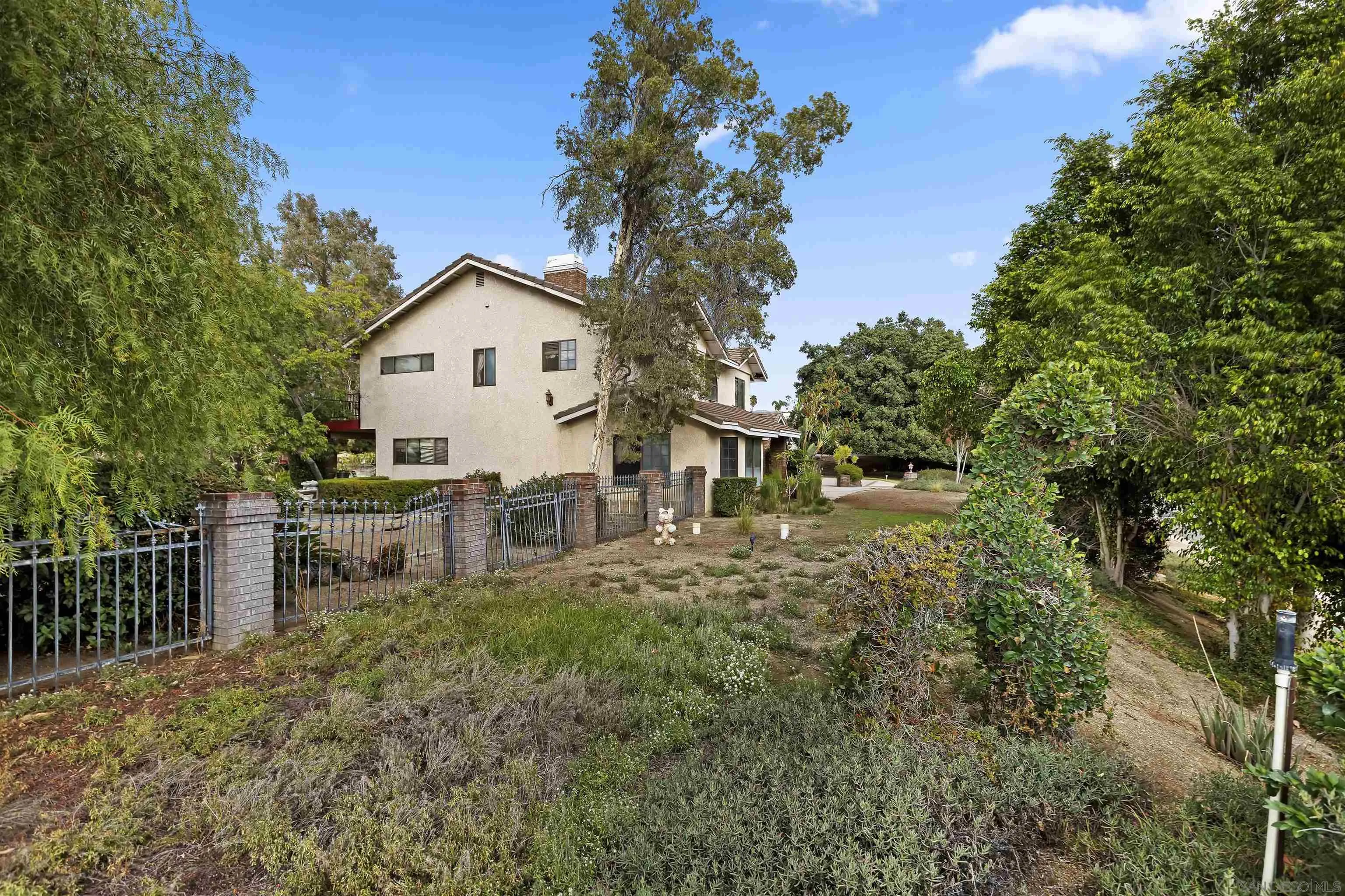 2109 Old Bridge Road Riverside, CA 92506 - Photo 7 of 57 a view of a house with a yard