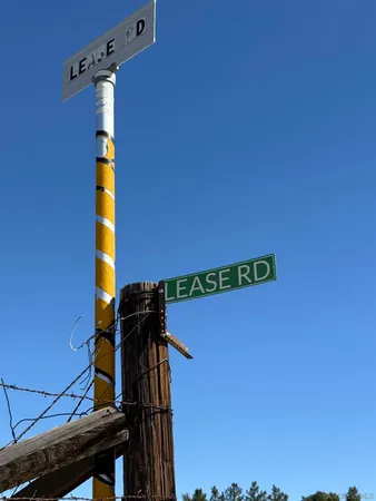 a view of a large body of water with a mountain in the background
