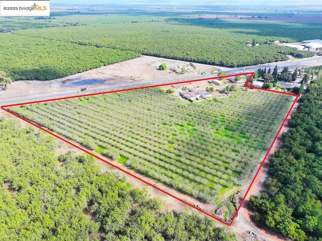 a view of a field with an outdoor space