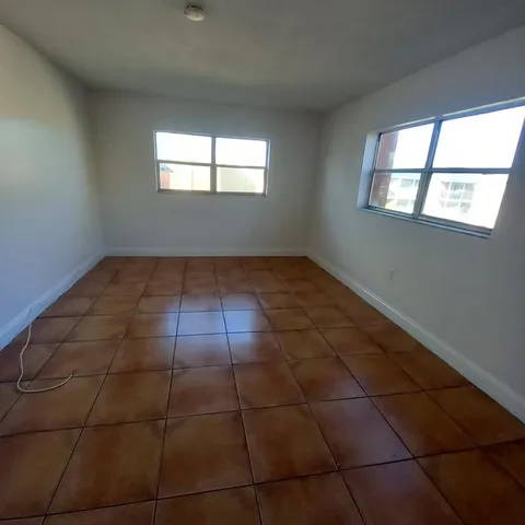 a view of a kitchen with windows