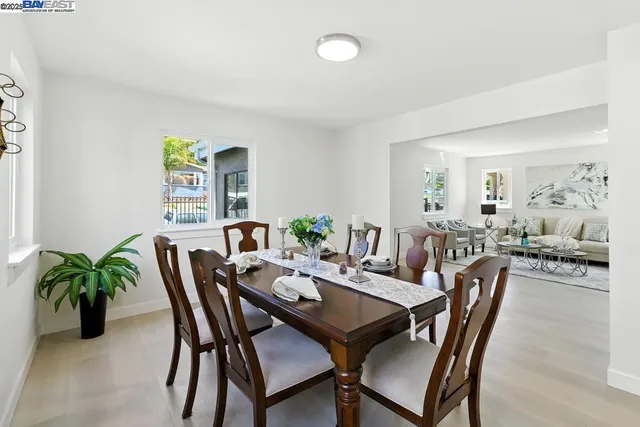 a kitchen with stainless steel appliances a stove a sink and cabinets