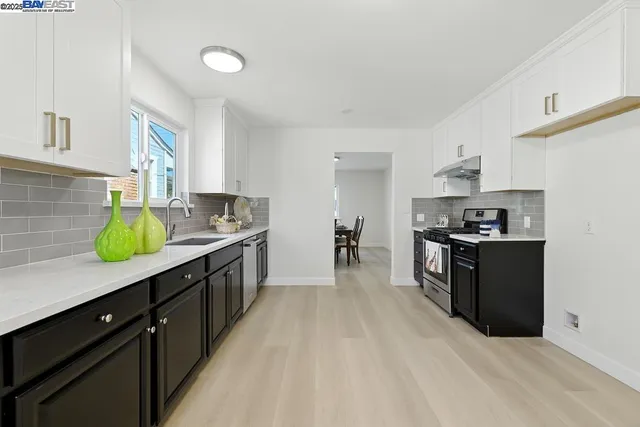 a view of kitchen dining table and chairs