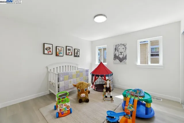 a view of gym equipment and children play room