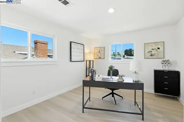 a bathroom with a shower sink and mirror