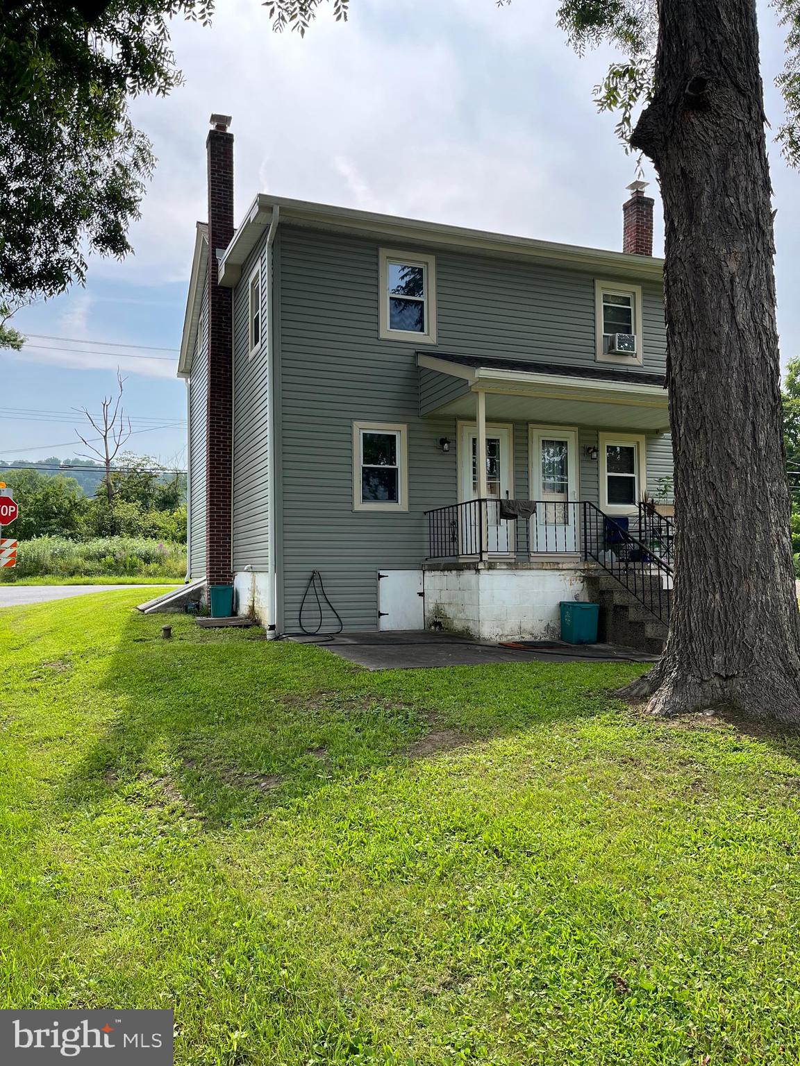 246 South Ironstone Drive Boyertown, PA 19512 - Photo 2 of 9 a house that has a big yard with wooden fence