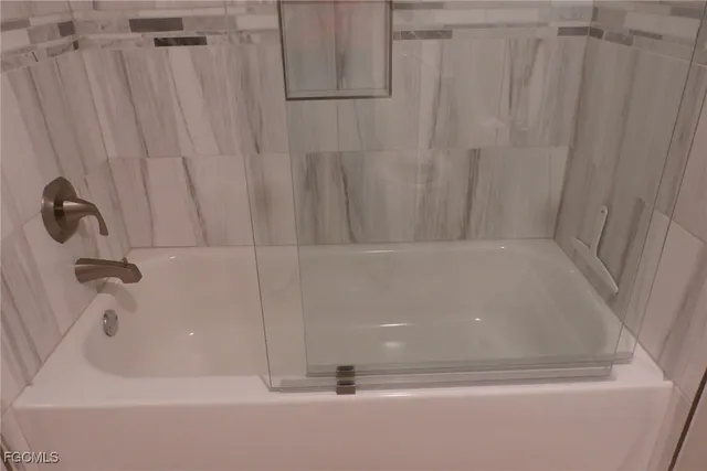 a bathroom with a bathtub
