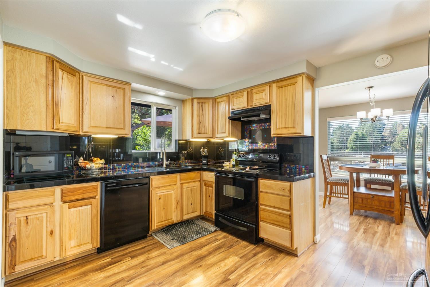 61969 Pettigrew Road Bend, OR 97702 - Photo 8 of 21 Updated kitchen counters, cabinets, sink