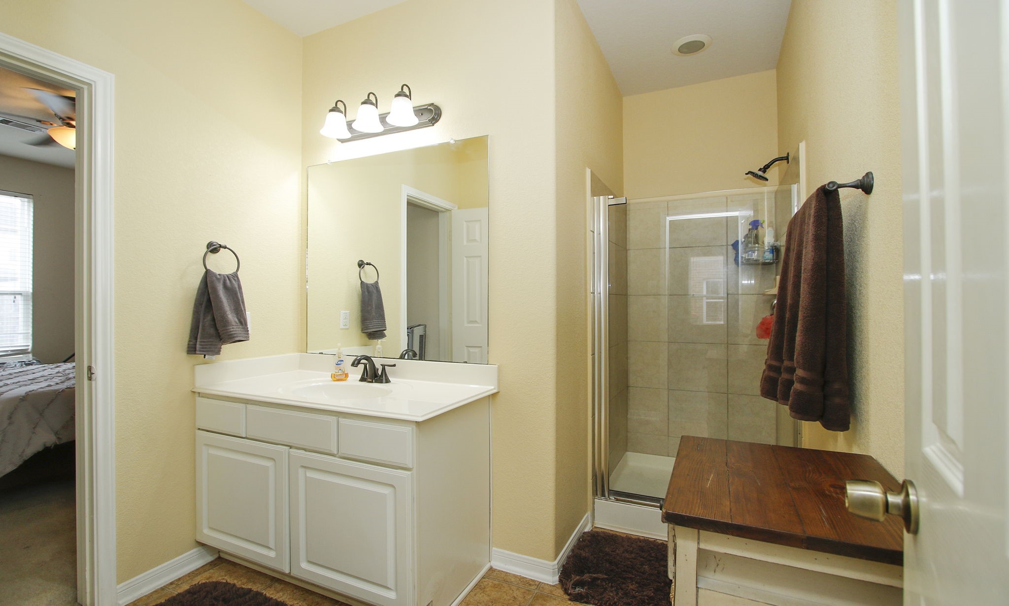 1031 Spring Heights Drive Spring, TX 77373 - Photo 23 of 41 a bathroom with a sink and a mirror