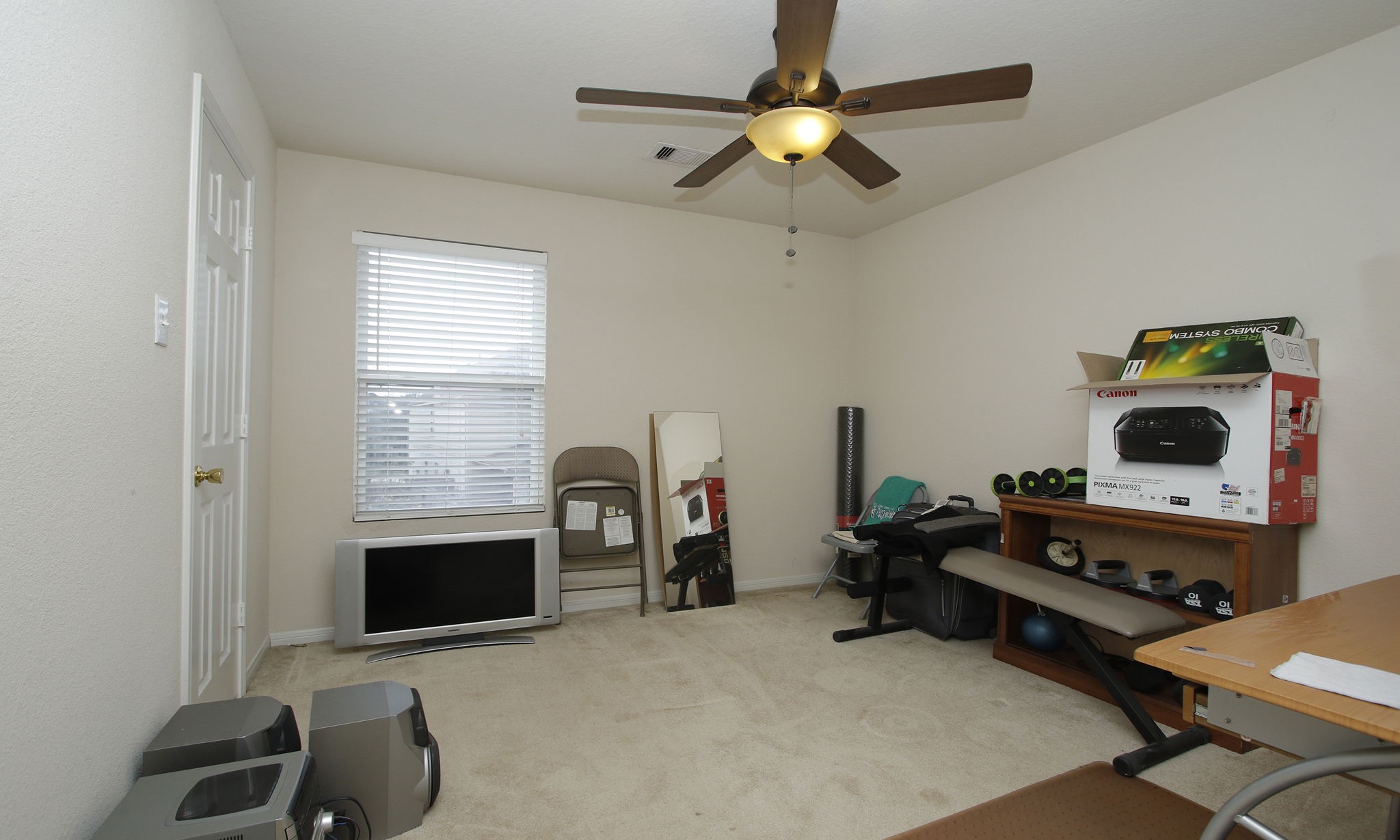1031 Spring Heights Drive Spring, TX 77373 - Photo 34 of 41 a bedroom with furniture and a fireplace