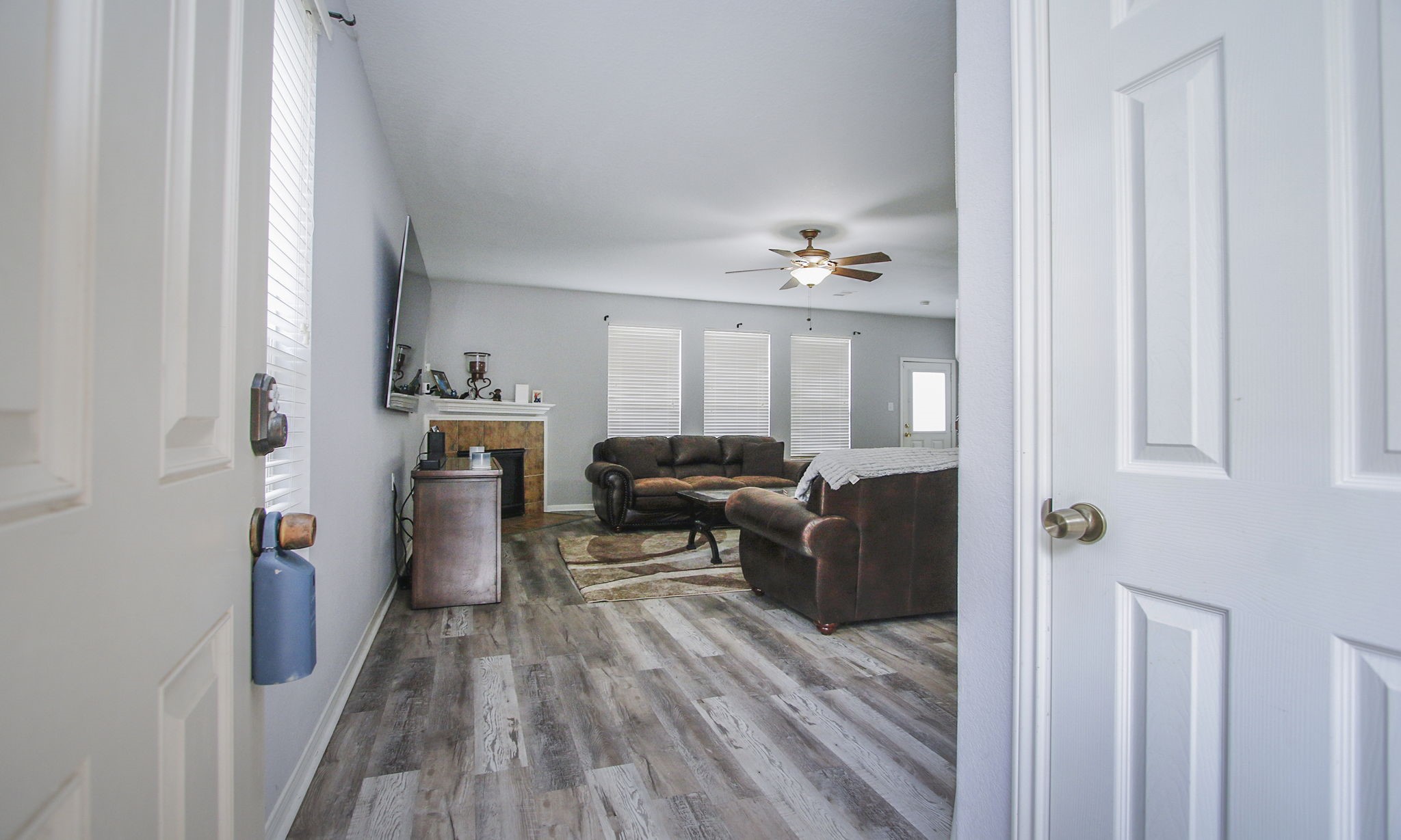 1031 Spring Heights Drive Spring, TX 77373 - Photo 5 of 41 a living room with furniture and a wooden floor