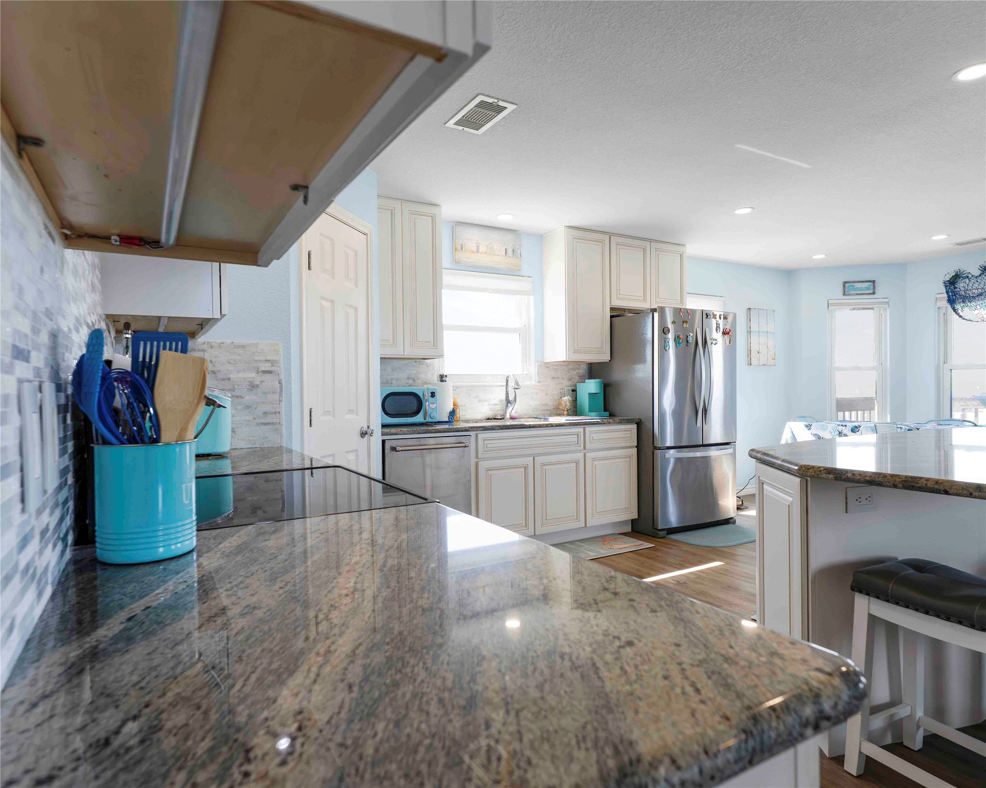 480 County Road 201 Sargent, TX 77414 - Photo 17 of 39 a kitchen with stainless steel appliances a refrigerator and a sink