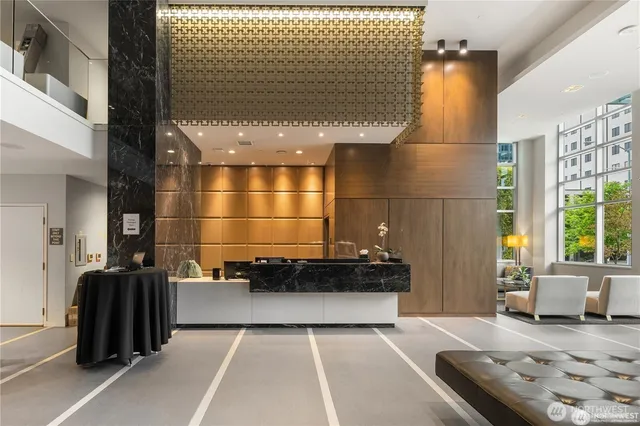 a living room with a couch and a table