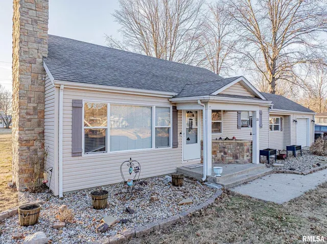 a front view of a house with patio