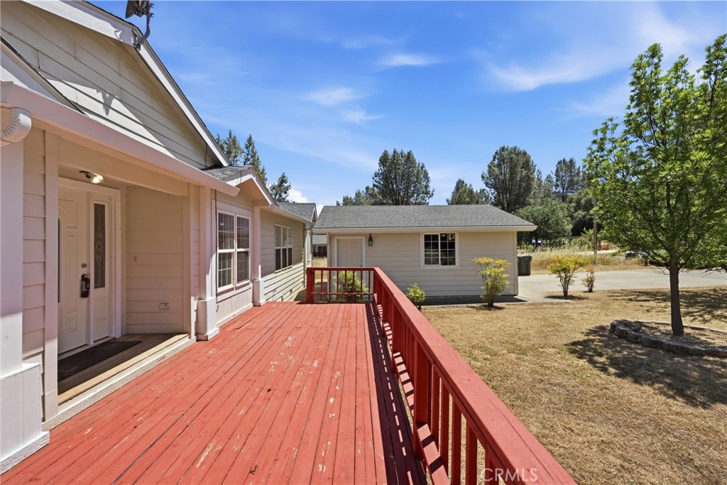 2860 Spring Valley Road Clearlake Oaks, CA 95423 - Photo 37 of 38 a view of a house with backyard and sitting area