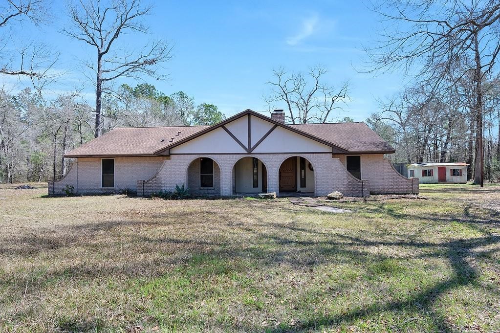 10235 White Rock Road Conroe, TX 77306 - Photo 1 of 25 a house view with a outdoor space