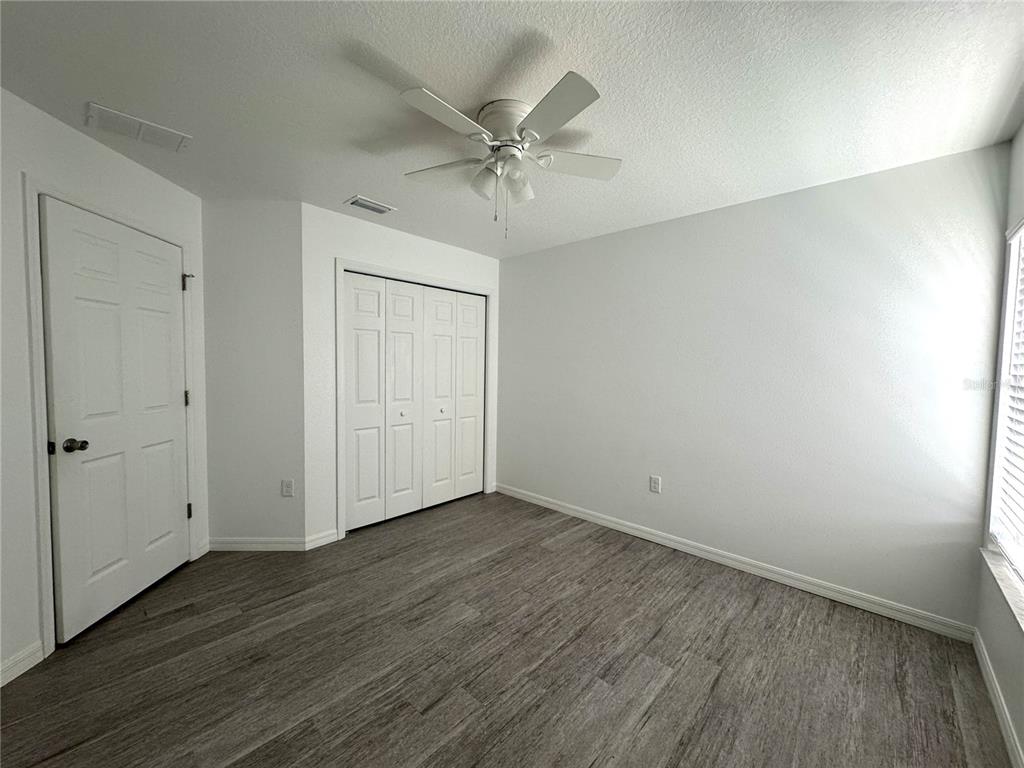 6386 East Rush Street Inverness, FL 34452 - Photo 14 of 21 wooden floor in an empty room