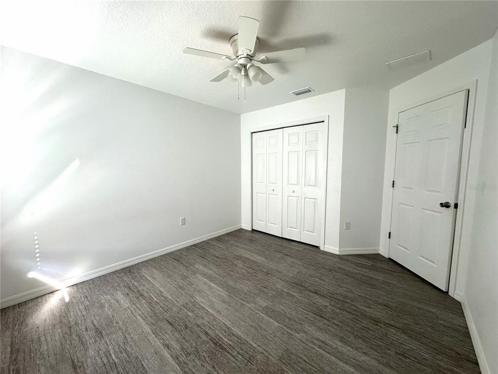 6386 East Rush Street Inverness, FL 34452 - Photo 17 of 21 wooden floor in an empty room