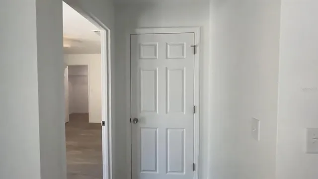 an empty room with a bathroom