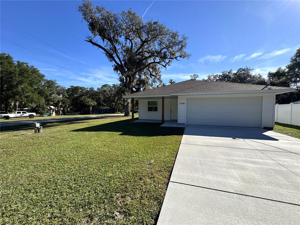 6386 East Rush Street Inverness, FL 34452 - Photo 21 of 21 a view of outdoor space yard and deck