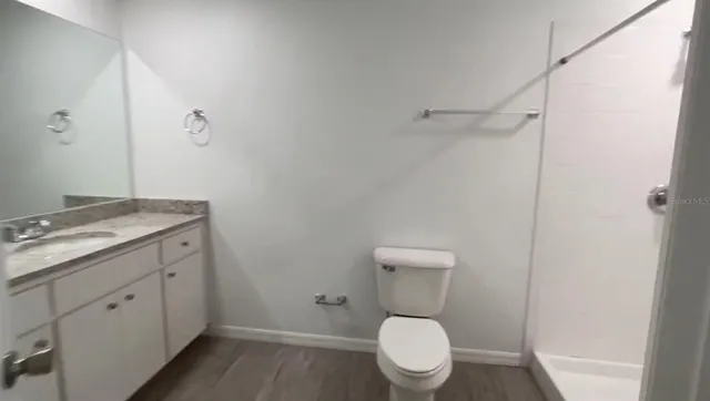 a bathroom with a sink and toilet
