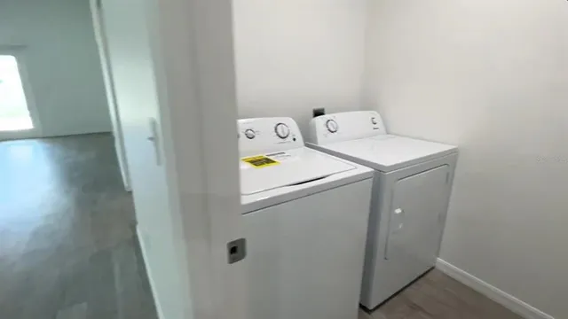 a utility room with dryer and washer