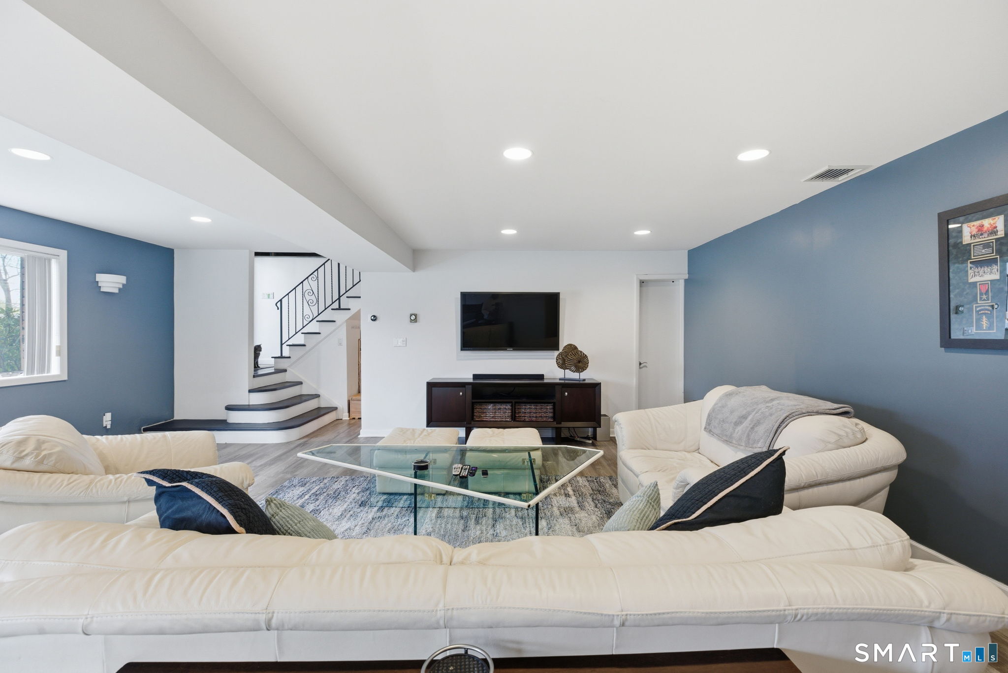 53 Dagmar Road Stamford, CT 06905 - Photo 34 of 40 Lower level living/entertainment/exercise room