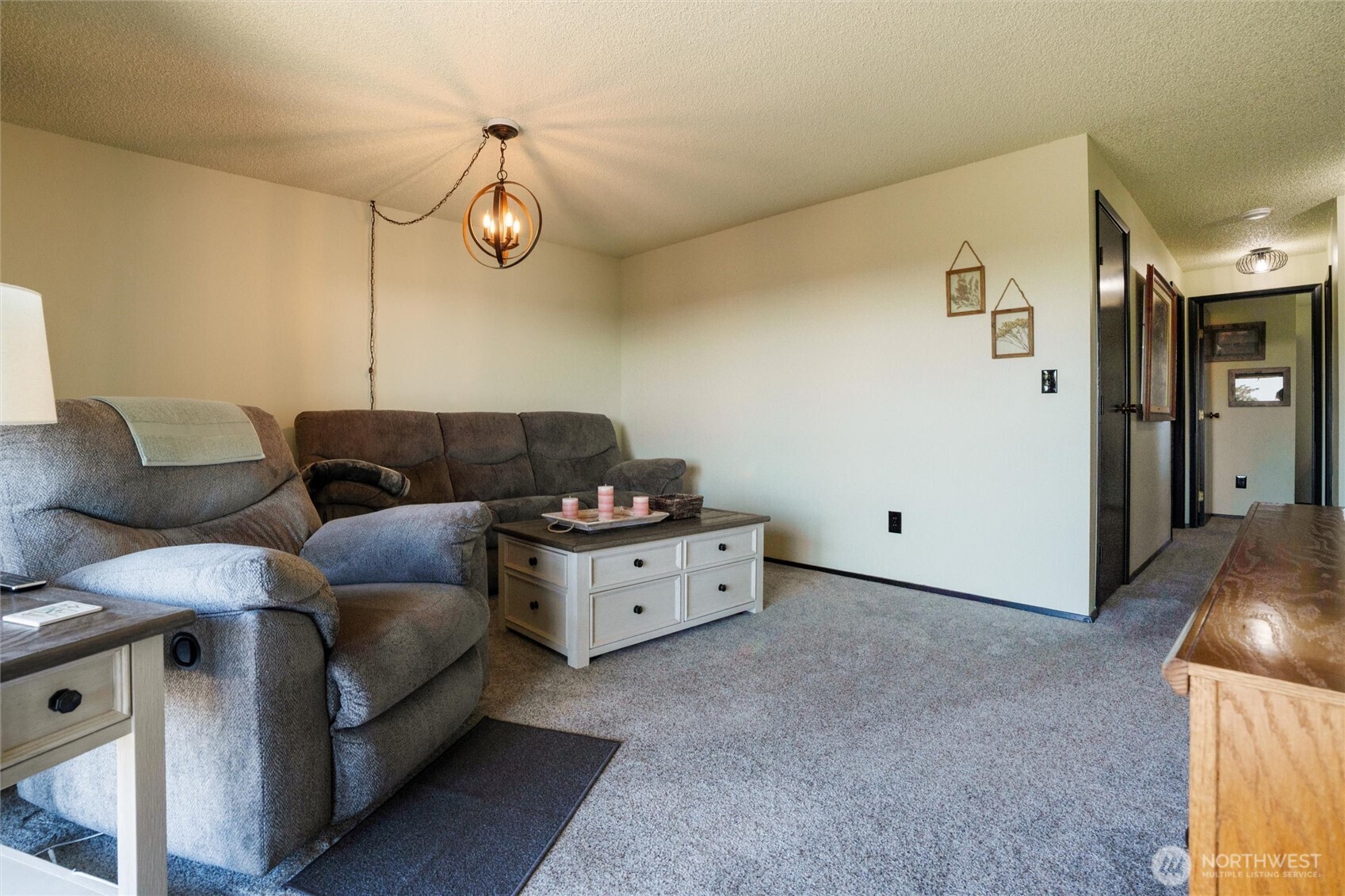 3560 Narrows View Lane Northeast, Unit 202 Bremerton, WA 98310 - Photo 19 of 30 a living room with furniture and kitchen view