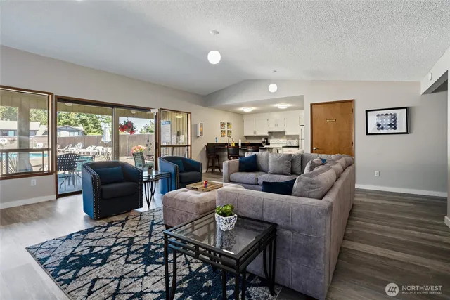 a view of sign board and green space