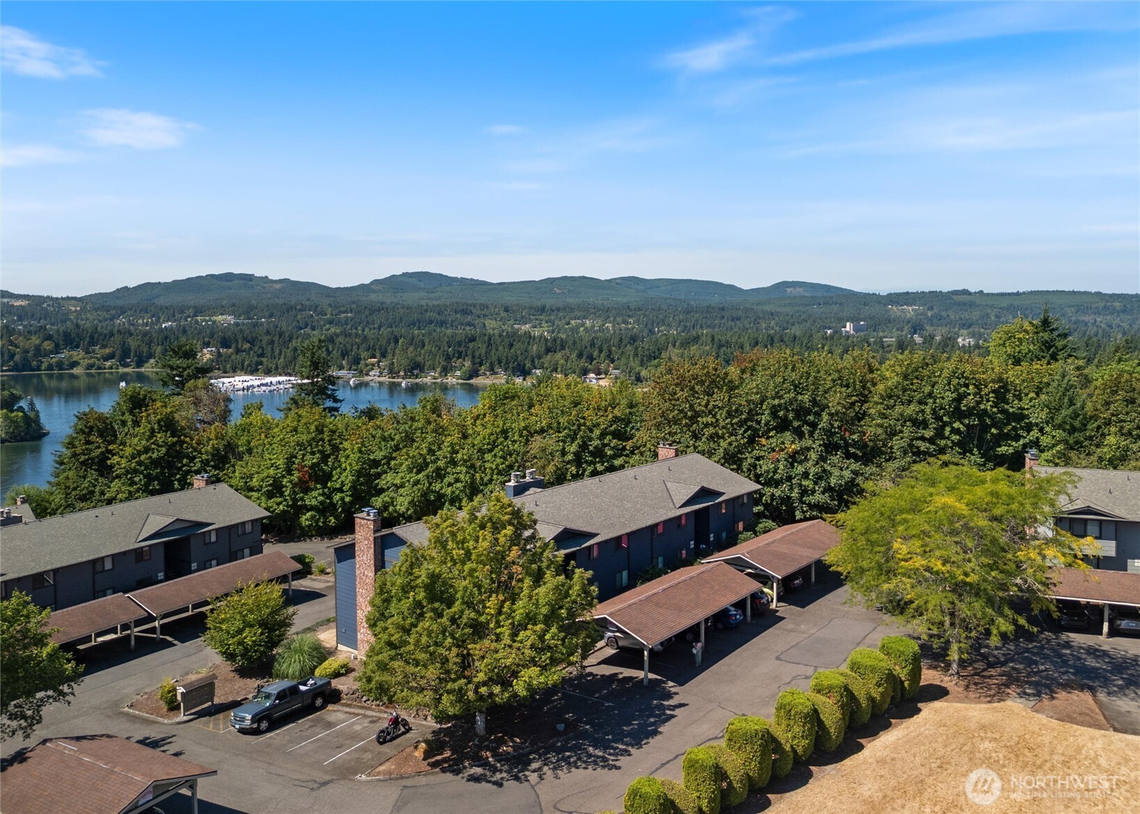 3560 Narrows View Lane Northeast, Unit 202 Bremerton, WA 98310 - Photo 6 of 30 an aerial view of a house with a garden