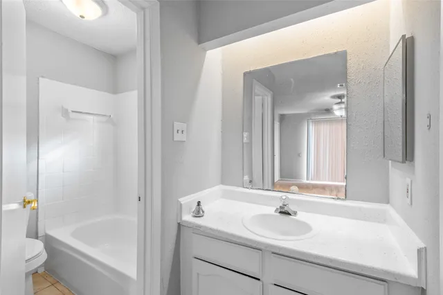 a bathroom with a sink and a bathtub