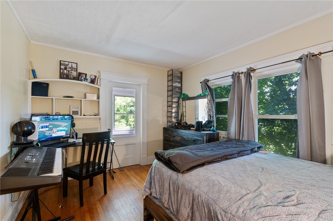 1960 Ridge Road Ontario, NY 14519 - Photo 29 of 43 THIS SECOND FLOOR BEDROOM EVEN HAS ITS OWN SUNPORC