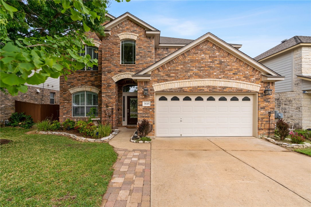 3648 Fossilwood Way Round Rock, TX 78681 - Photo 1 of 1 a view of a house with a yard