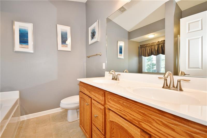 335 Maple Ridge Drive Canonsburg, PA 15317 - Photo 15 of 25 The master bath with dual vanity makes getting ready for the day or an evening out a breeze.