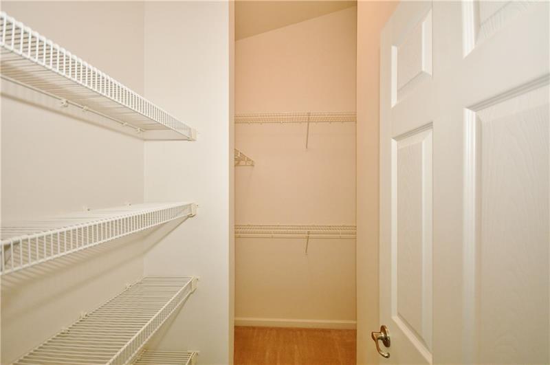 335 Maple Ridge Drive Canonsburg, PA 15317 - Photo 17 of 25 The owner's suite walk-in closet is set up with shelving to truly maximize the space.