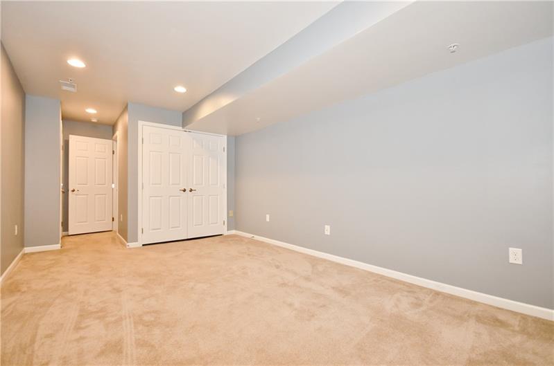 335 Maple Ridge Drive Canonsburg, PA 15317 - Photo 22 of 25 The finished game room is a great place for entertaining or watching the game.