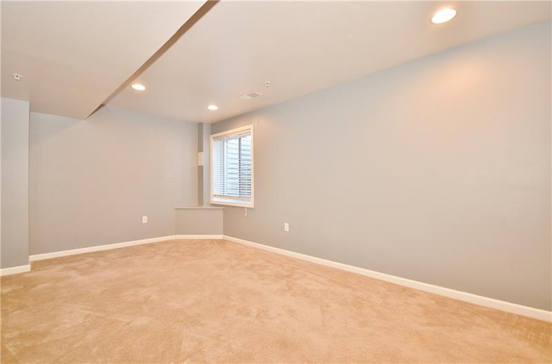 335 Maple Ridge Drive Canonsburg, PA 15317 - Photo 23 of 25 The recessed lighting is a great feature in the game room.