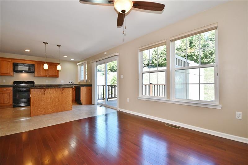 335 Maple Ridge Drive Canonsburg, PA 15317 - Photo 10 of 25 Whether sitting down for a family meal or having a few friends over for dinner, they'll be impressed with your dining area. We're loving the hardwood floors!