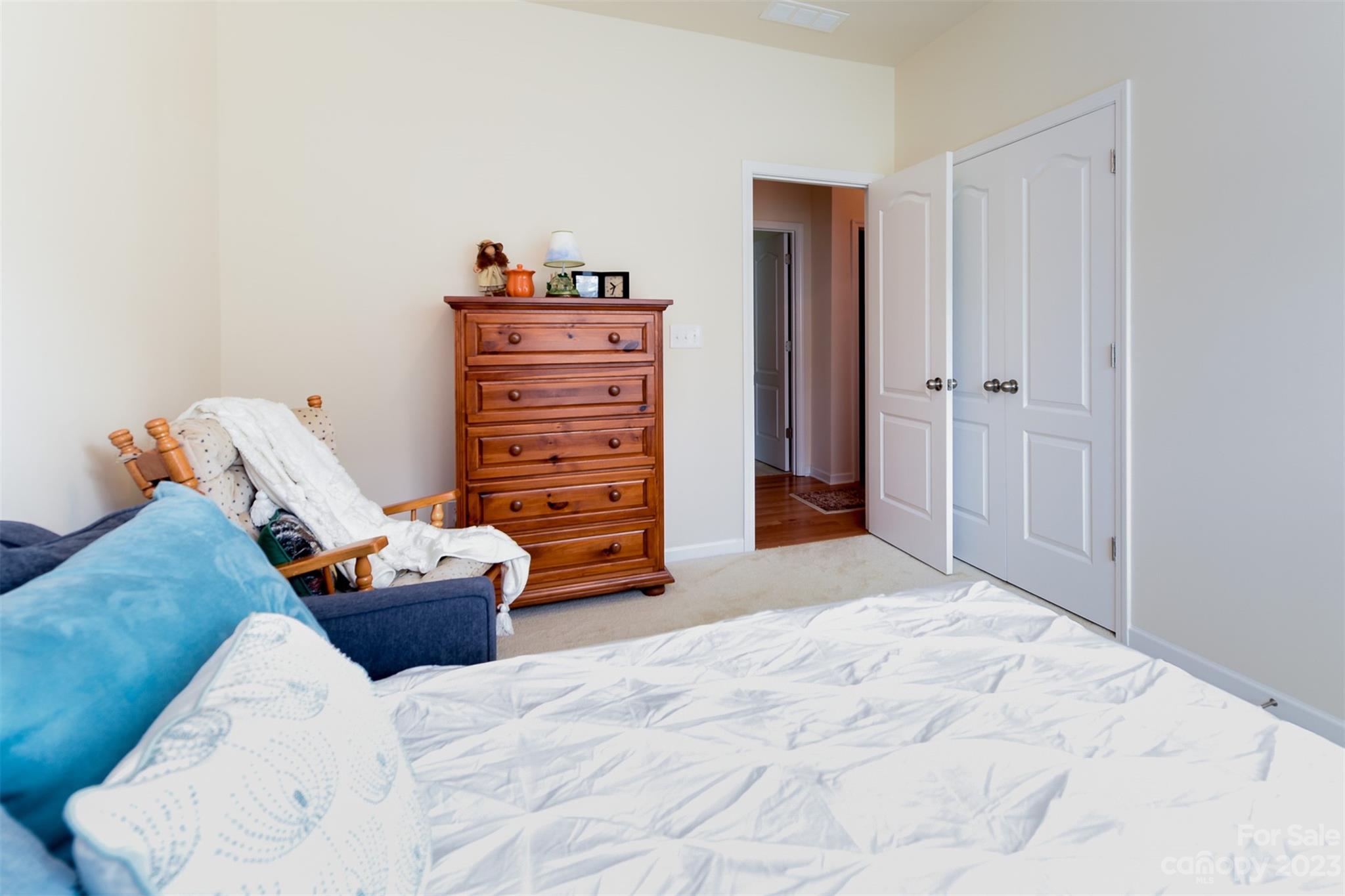 1723 Still River Way Fort Mill, SC 29708 - Photo 23 of 38 a bedroom with a bed and closet
