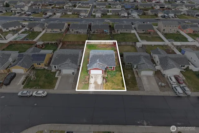 an aerial view of a residential houses