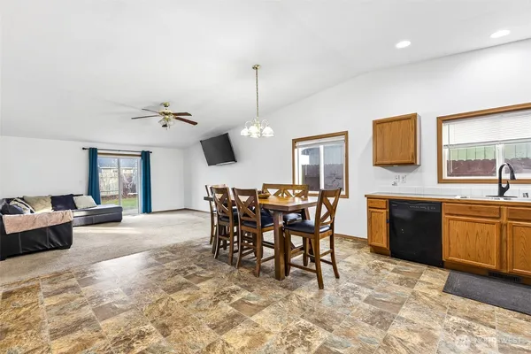 a view of a dining room with furniture