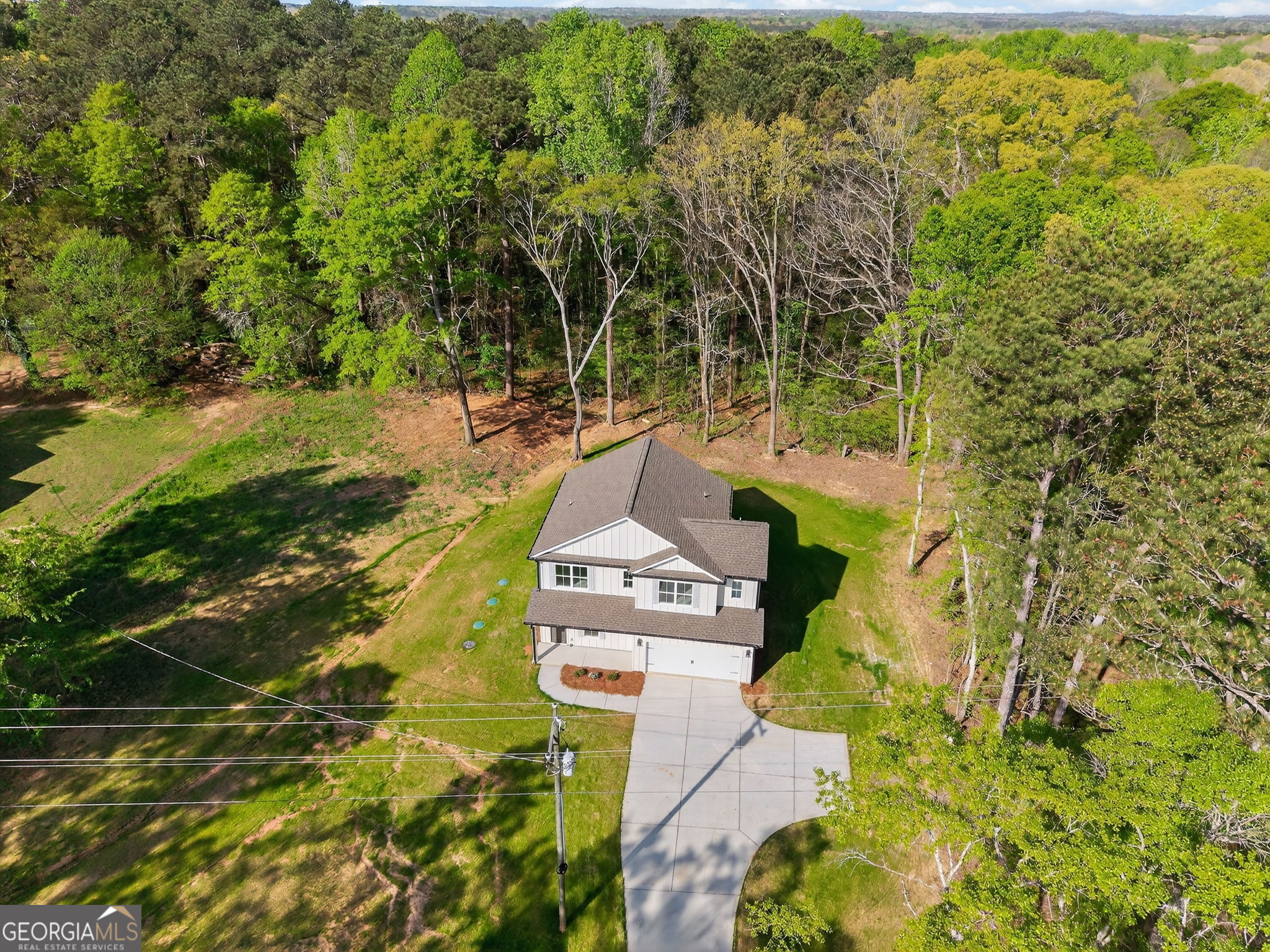1229 Chappell Mill Road Jackson, GA 30233 - Photo 15 of 55 view of a houses with yard