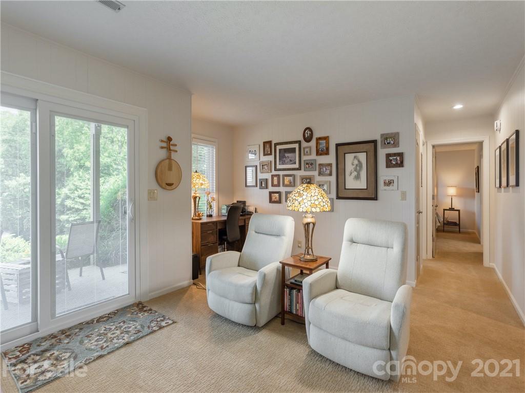 116 Country Ridge Road Laurel Park, NC 28739 - Photo 21 of 26 a living room with furniture and a gate