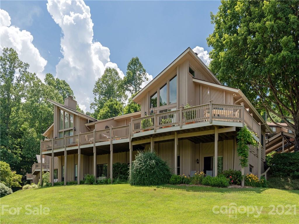 116 Country Ridge Road Laurel Park, NC 28739 - Photo 26 of 26 a view of a house with yard and plants