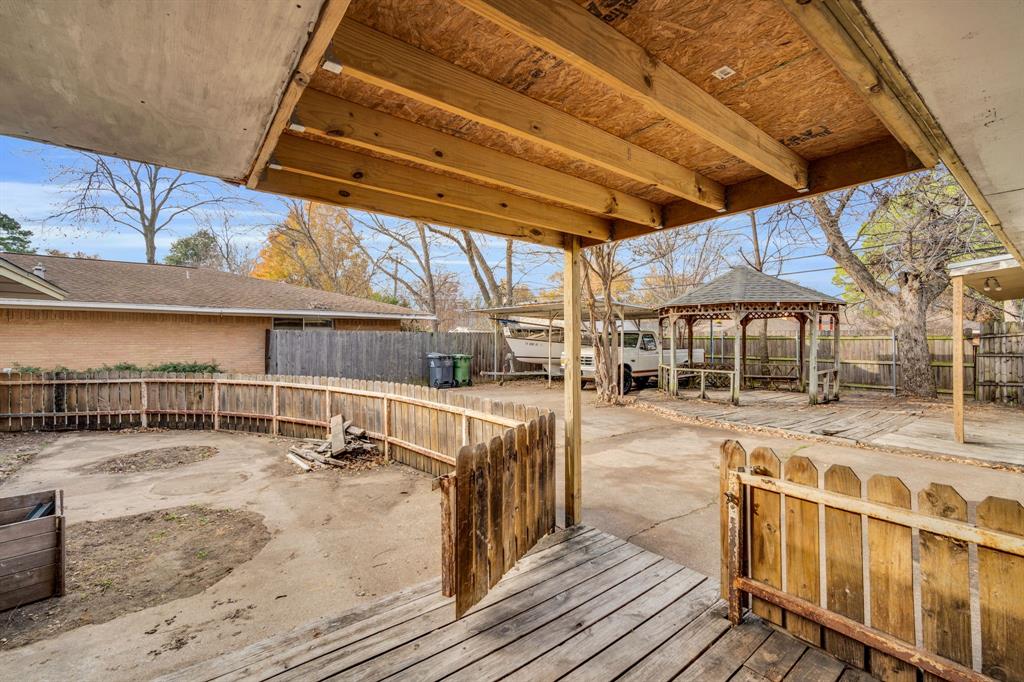 1320 Apache Street Arlington, TX 76012 - Photo 25 of 27 a view of a swimming pool with a patio