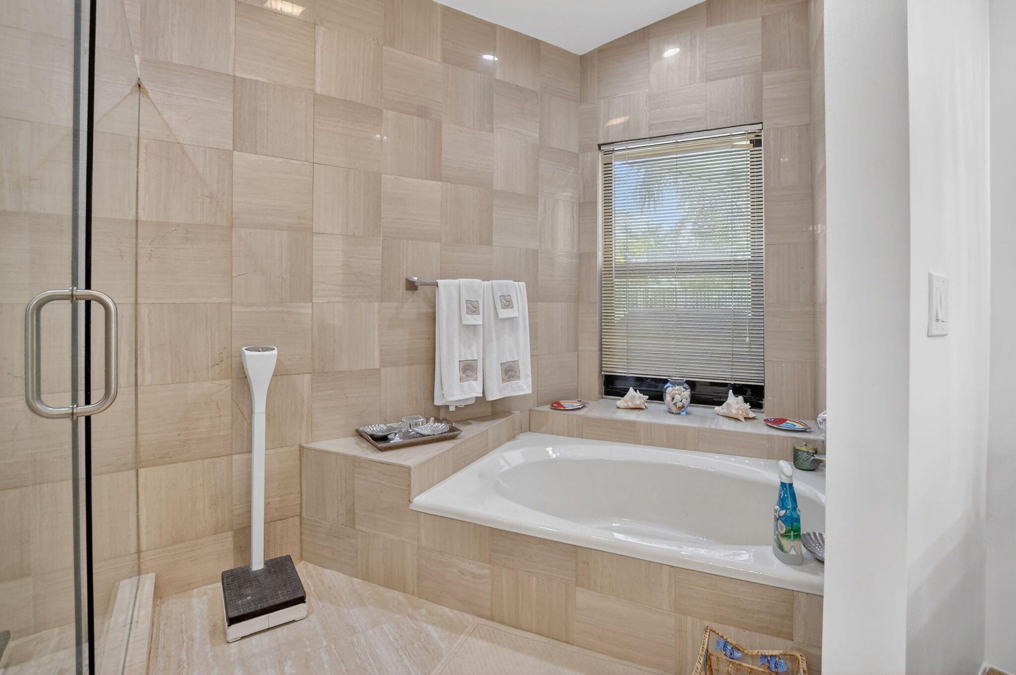 22519 Esplanada Circle, Unit W Boca Raton, FL 33433 - Photo 34 of 57 a bathroom with a tub a sink and a window