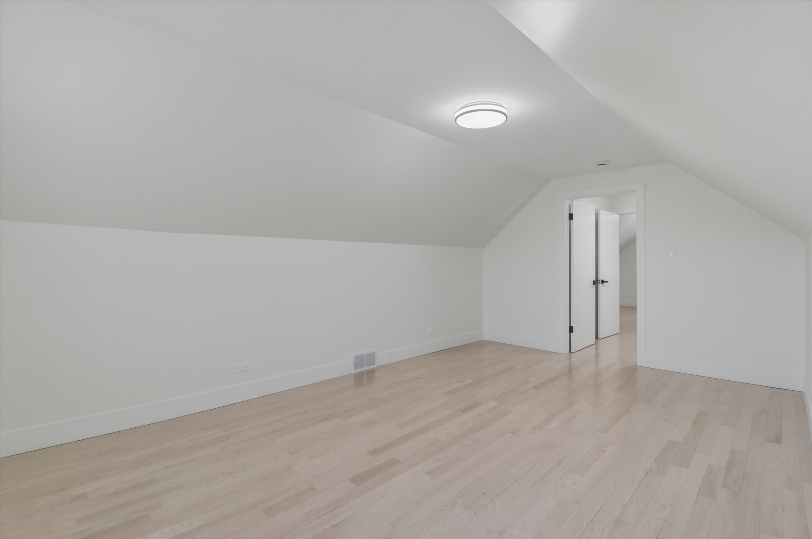 7230 South Avers Avenue Chicago, IL 60629 - Photo 19 of 44 an empty room with wooden floor and window