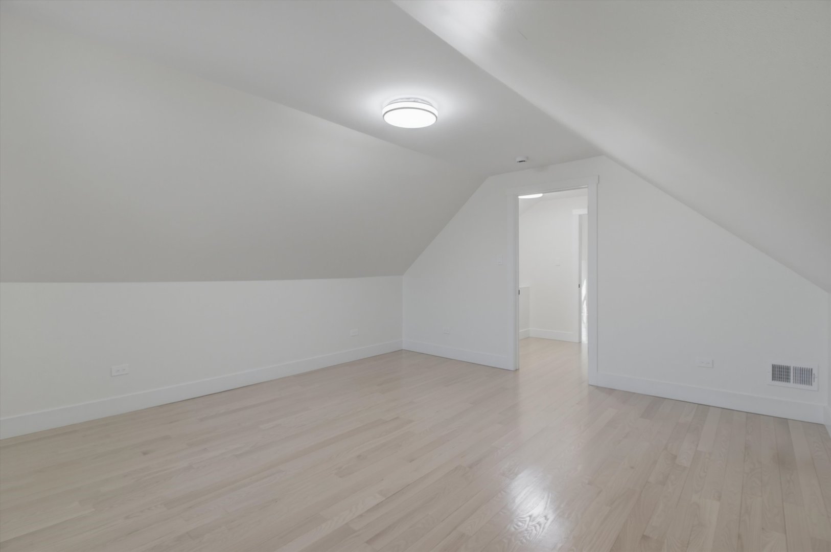 7230 South Avers Avenue Chicago, IL 60629 - Photo 21 of 44 an empty room with wooden floor and windows