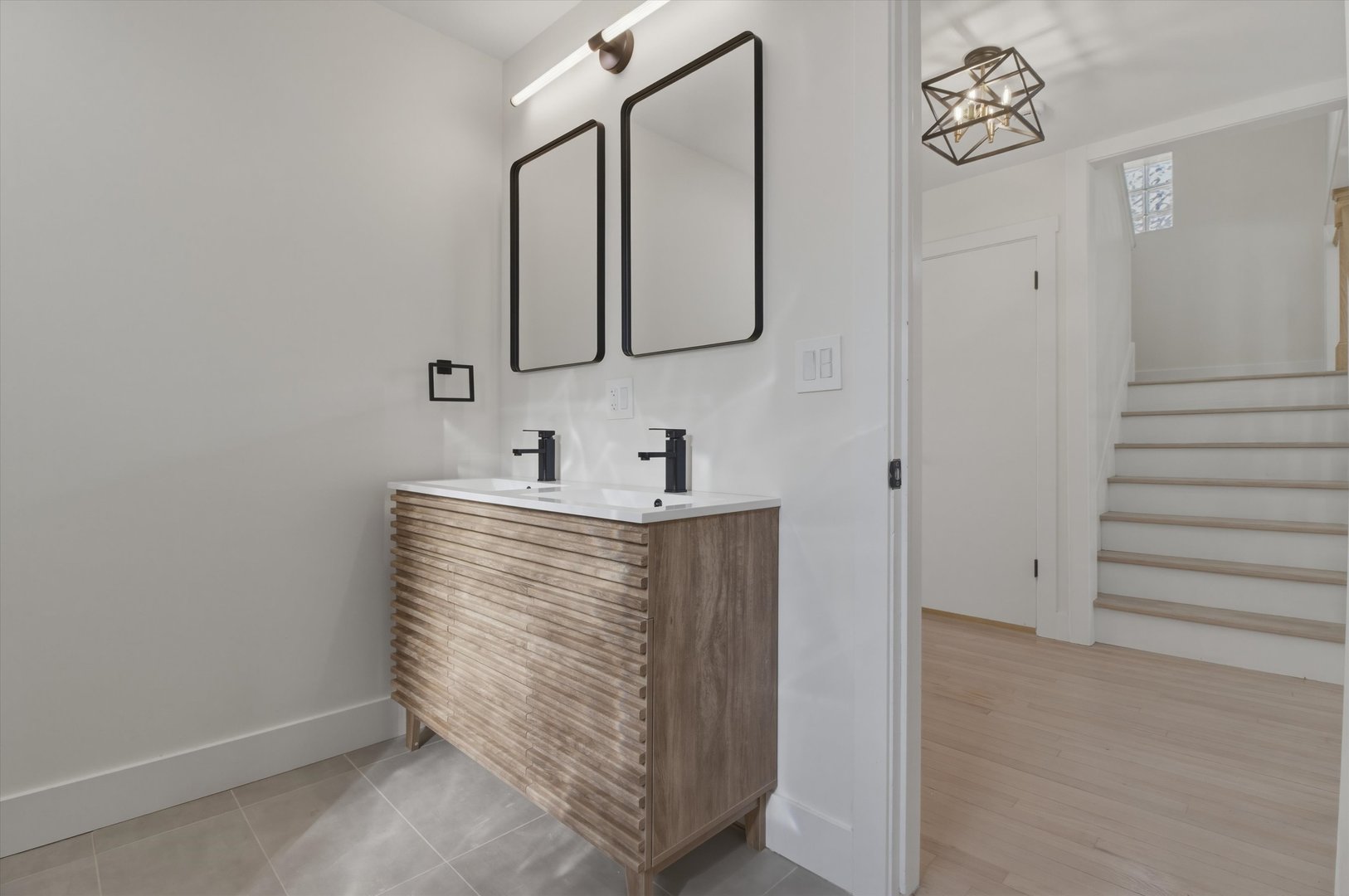 7230 South Avers Avenue Chicago, IL 60629 - Photo 28 of 44 a bathroom with a sink and a mirror