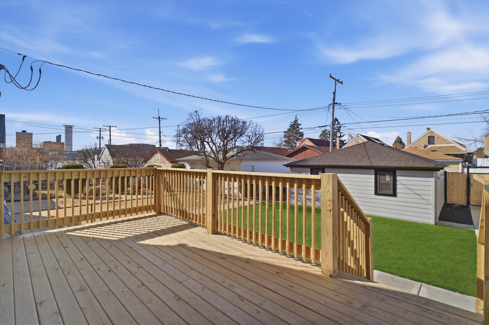 7230 South Avers Avenue Chicago, IL 60629 - Photo 33 of 44 a view of a balcony with wooden floor
